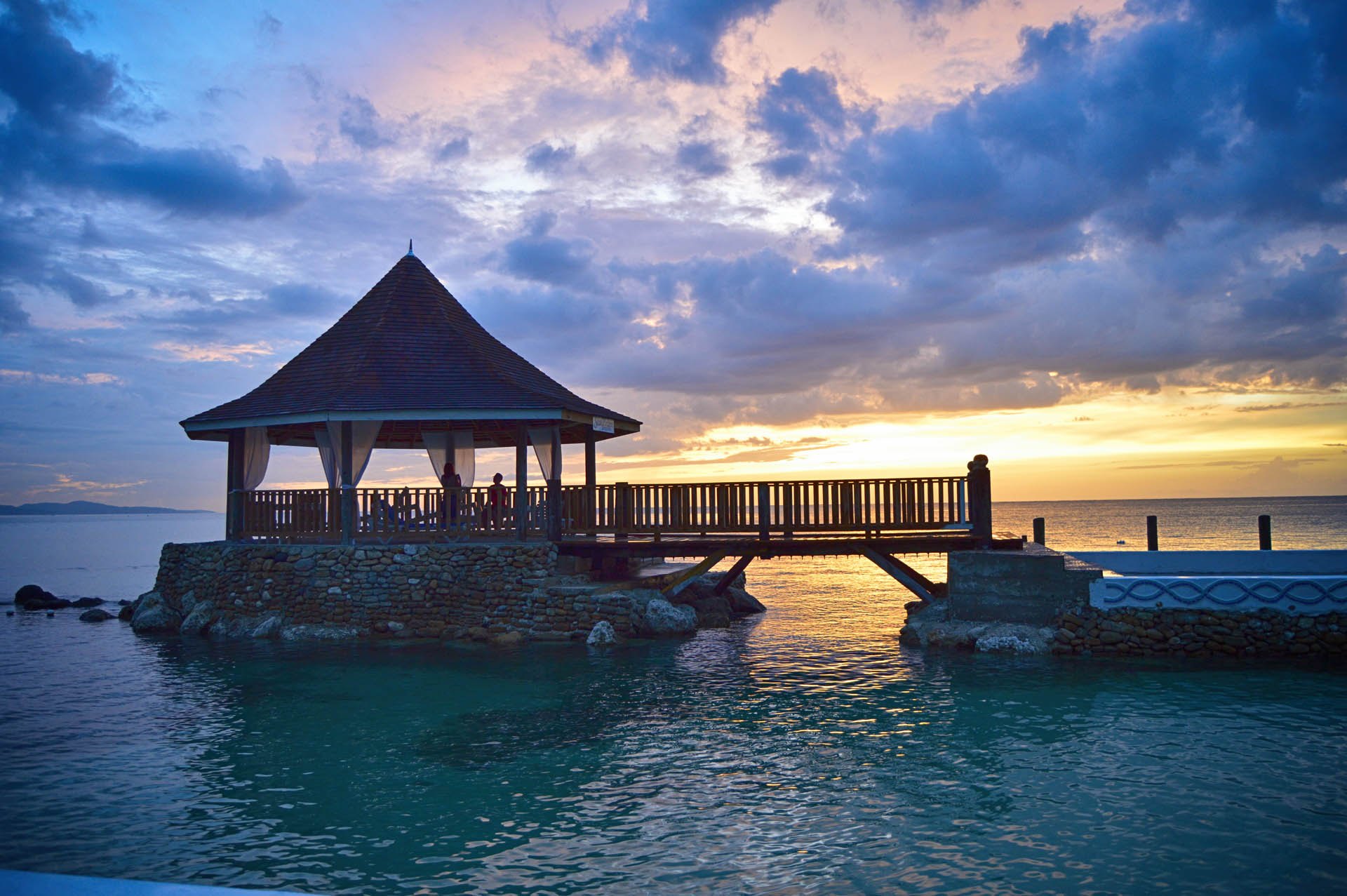 Evening falls on the cove at SeaGarden Beach Resort
