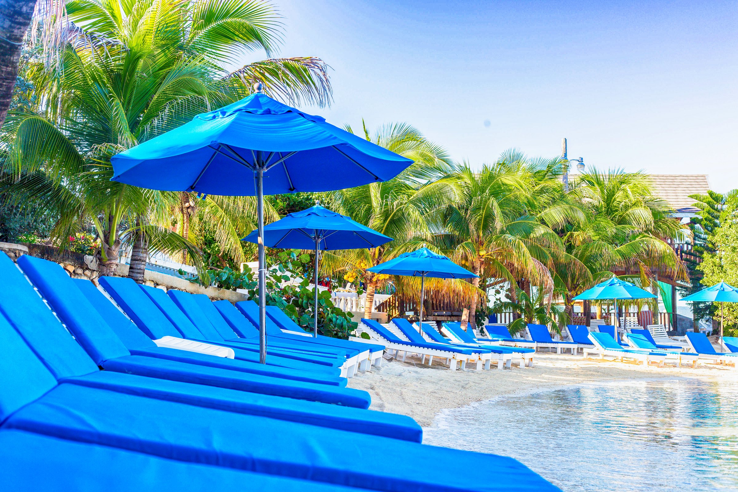 The pool, steps from the sea at SeaGarden Beach Resort