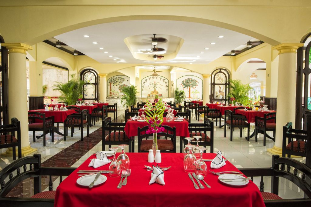 Set table with arched windows in The Jasmine dining room