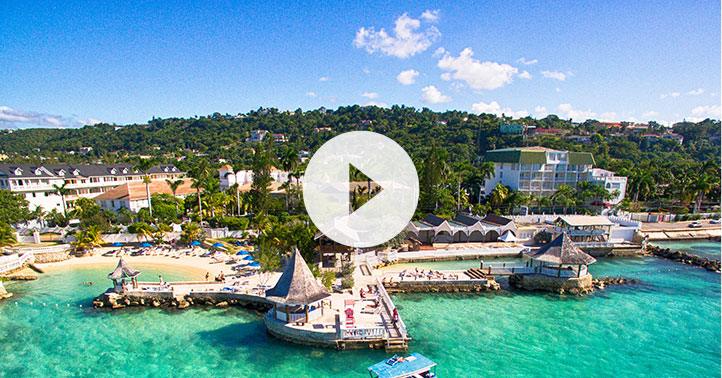 Aerial video still of SeaGarden Beach Resort and its private beach club