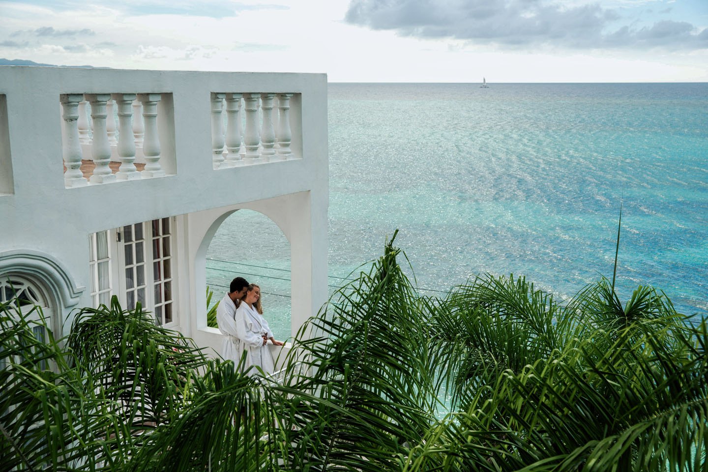 A couple in the seaside arch at SeaGarden