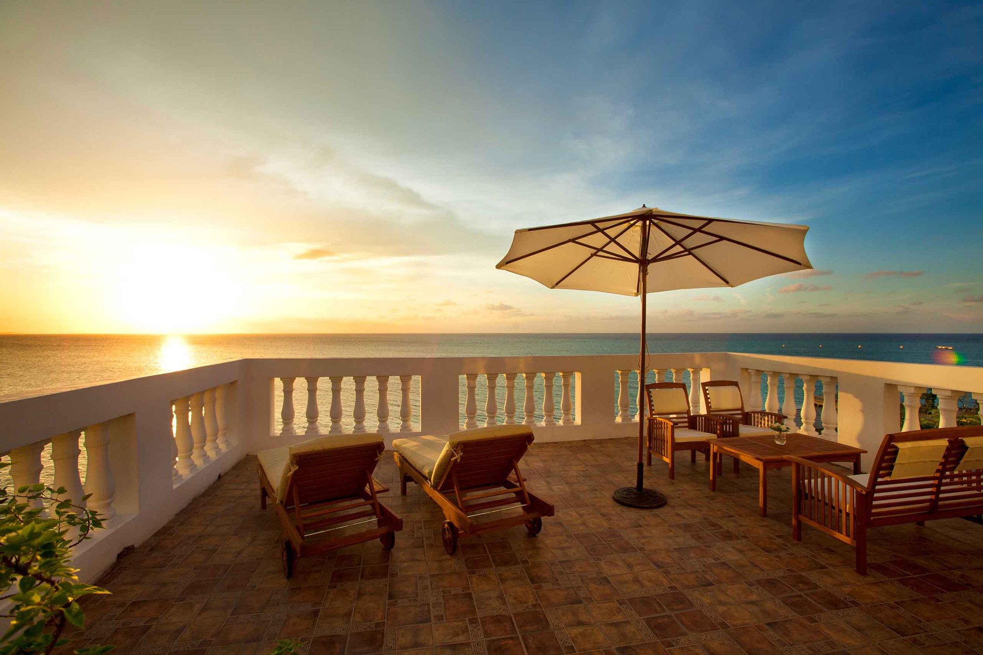 Sunset from a suite balcony at SeaGarden Beach Resort
