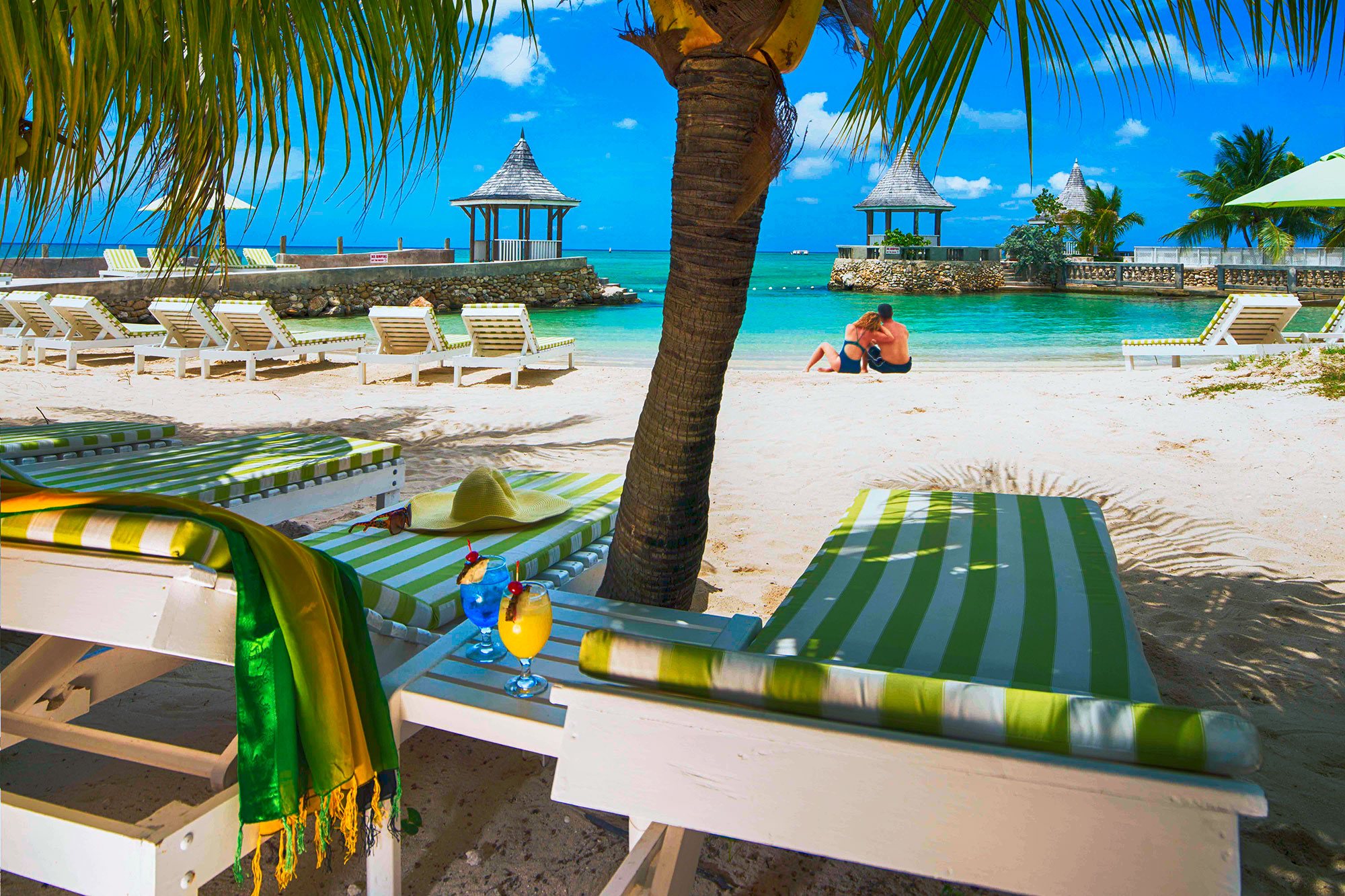 A walk on the private beach at SeaGarden Beach Resort