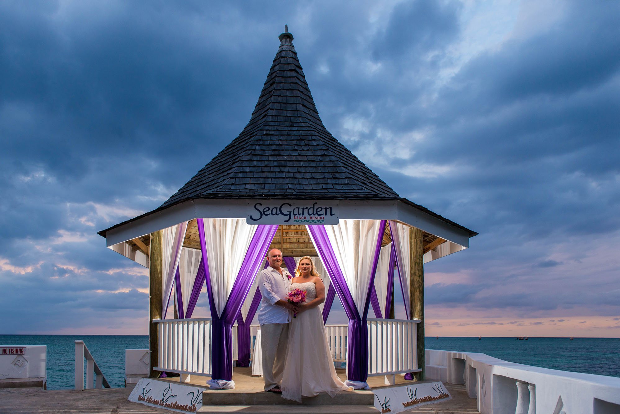 A gazebo ceremony at SeaGarden Beach Resort