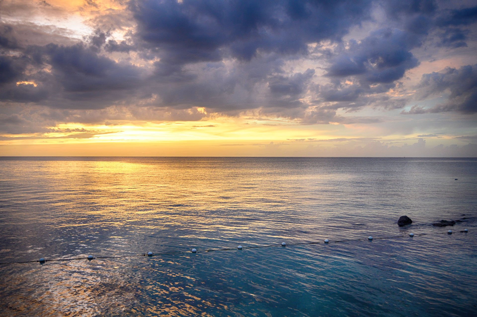 Sunset over the bay at SeaGarden Beach Resort